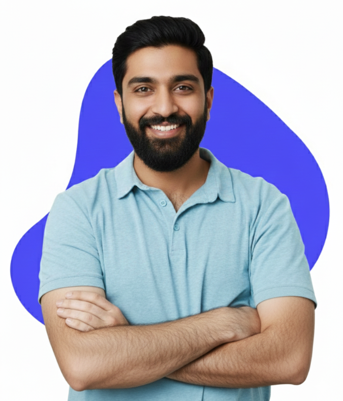 portrait of a serious indian man in a peach nike shirt and sports watch, posing with his hand on his chin.