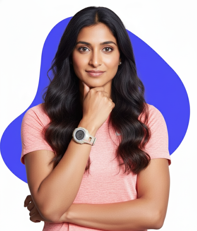 woman in a pink shirt and a sports watch, looking at the camera.